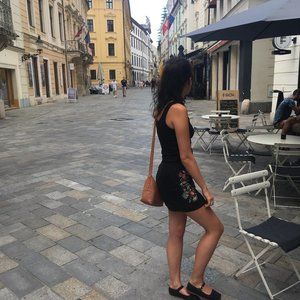 Black embroidered mini skirt